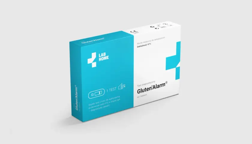 Pudełko testu diagnostycznego Gluten'Alarm do samokontroli, z symbolem krzyża i napisem "LAB HOME".